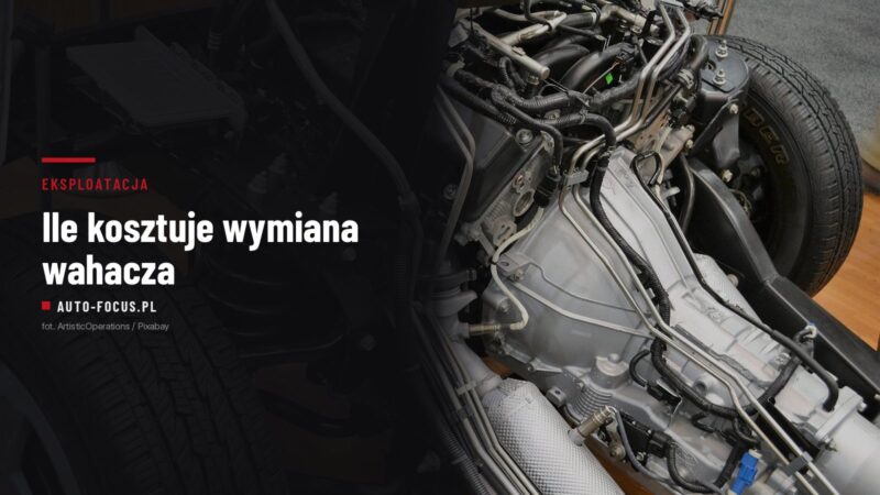Odsłonięte podwozie samochodu z widocznym wahaczem przednim, sprężyną i kołem